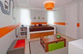 The pale yellow niche for toys bring an element of depth to the space. How To Design And Decorate Kids Rooms