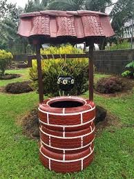 This one is really fast and easy to build and when it is finished, you will have a rustic looking wishing well to grace your garden or front yard. Wishing Well Planter Made From Recycled Tires The Owner Builder Network