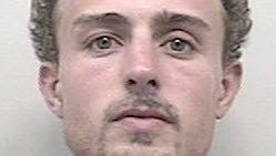 Woman gets tough with armed home invaders