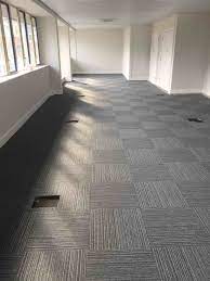 Flooring Dark Grey Color Tessalated Pattern Of Carpet Tiles Create More Interesting Floor Layouts Floorin Carpet Colors Patterned Carpet Stair Runner Carpet