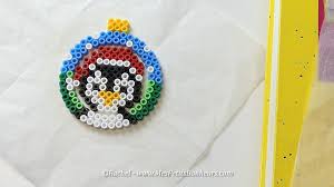 Boules De Noel Sapin Et Pingouin En Perles Hama Modeles Et Tuto Perles A Tisser Perle Hama Modele Schemas De Bijoux En Perles