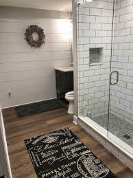 Cute Bathroom With White Subway Tiles Dark Grout And Rustic Vinyl Flooring Waterprooffloor Vinyl Plank Flooring Bathroom Vinyl Flooring Luxury Vinyl Flooring
