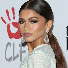 Pretty curly black bob with side bangs. 10 Low Ponytail Hairstyles That Aren T Boring