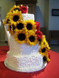 Scrumptious sunflower and babys breath adorned wedding cake on rustic. Sunflower And Roses Number Cake Novocom Top