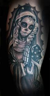 These tattoos usually include images of la catrina, a beautiful woman in the makeup of sugar skulls, representing death. Catrina Day Of The Dead Realistic Realism Religious Spiritual Woman Tattoo Slave To The Needle