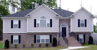 If you walk in the front door, and then have to climb an entire flight of a dozen or more steps to reach the main living floor (living room, kitchen, etc.), you're in a raised ranch. Raised Ranch Homes House Plans And More