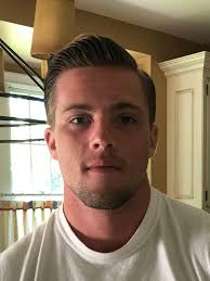 Charlie Burke; son of Greg Burke Graduate of the University of Scranton  2020 A captain of the wrestling team! With his first pandemic haircut!