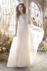 Designer lazaro perez gives classic silhouettes a fresh update with the use of illusion necklines and lovely venise lace applications, injecting a bit of refined drama to an otherwise soft and romantic collection. Tara Keely Wedding Dresses In Sacramento Bride To Be Couture
