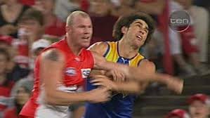 'big bad bustling' barry hall made his afl debut for st kilda in 1996. Sydney Swans Player Barry Hall Punches His West Coast Eagles Opponent Brent Staker Abc News Australian Broadcasting Corporation