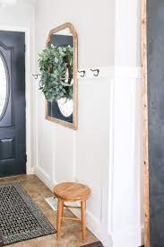 Then, the small stools underneath pull out easily so you can sit down and slip off your shoes, or just drop your coat or purse for a moment on your way that means that if your home is on the small side overall and not just in the entryway, it's also a great way to stock and store a little extra emergency. How To Decorate A Small Entryway Little Glass Jar