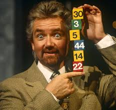 E.R.N.I.E. ------------ You can hear his cogs spin round After you have  spent your pound, And the cheers from the public If a winning number's  found He's working for the Government (The