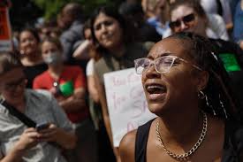 Abortion-rights activists react after the announcement to the Dobbs v  Jackson Women's Health Organization ruling in front of the U.S. Supreme  Court