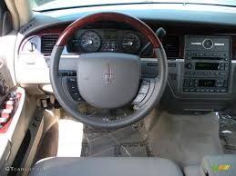 Image result for Light Ice Blue 2010 Town Car