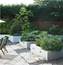 Contemporary Garden Design In Surbiton Surrey Rendered Blockwork Walls Large Patio Raised Bord Garden Design Contemporary Garden Design Contemporary Garden