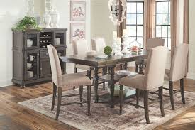 The Audberry Dark Gray 8 Pc Rectangular Dining Room Counter Ext Table 6 Upholstered Barstools Server Ashley Dining Room Dining Room Server Grey Dining Room