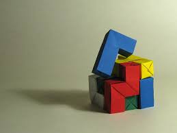 It consists of seven puzzle pieces. Soma Cube Jean Baptiste Vincent Happy Folding