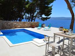 Der Pool Und Die Terrasse Ferienwohnung Kroatien Am Meer Ferienhaus Ferienhaus Am Strand
