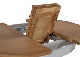 A solid oak dining table can last for decades and is one of the most worthwhile investments you can make for your furniture. Oak Extendable Round Dining Table Hudson Ez Living Furniture