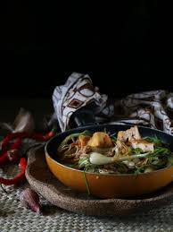 Masukkan tepung terigu ke dalam adonan. Dapur Miranti Tumis Bawang Lokio