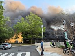 What caused the bus fire that blanketed Downtown DC in smoke?