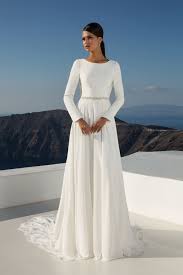 Two years after clare waight keller designed meghan markle's wedding dress for givenchy, the designer has given fans a behind the scenes look at the royal wedding. Meghan Markle S Wedding Dress Unveiled Justin Alexander