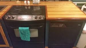 This stove top cover is painted in gray and then is white washed. How To Paint Oven Stove Range My Oven Make Over Update Youtube