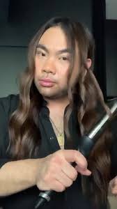 With Danny Luu from Oscar Oscar Brisbane City ✨, “This is my second day  hair and I only need to curl the front. The back of my hair doesn’t need  extra styling because I use my @silkandco silk ...