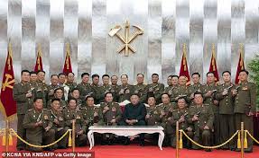 Kim jong un surprised many by saying much of the previous economic plan had failed. Kim Jong Gun North Korean Generals Pose Like Gangsters Alongside Their Leader With Pistols Daily Mail Online