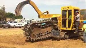Rex Moore Electrical trenching with Vermeer T655