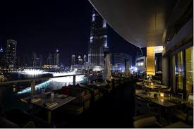 The best way to enjoy dubai fountain's light and sound show is by booking a table at a restaurant with outdoor seating overlooking the fountains. Mall Dining Elevated Katsuya Ezrani