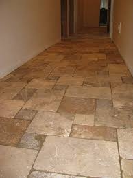 The tumbled travertine tile has been put through an intentional process to get this texture. Tumbled Stone Tile Bathroom Tumbled Travertine Tile Fro Rustic Home Flooring Ideas Travertine Tile Travertine Floor Tile Tile Floor Tumbled Travertine Tile