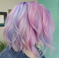 Blue Pink And Purple Hair All These Tones Are Pastel And Were Hair Painted In For A More Loose Blended Look Hair Stylist Hair Painting Purple Hair