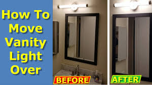 I'm wanting sconces that are hardwired into the wall, but also include at least one electrical outlet on the hey friends! How To Move Off Center Vanity Light Over On Bathroom Wall Youtube