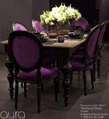 Mahogany table, elegant chandelier and stylish plum dining room chairs create the ultimate entertaining space for family feasts or intimate dinners for two. Fantastic Wood Purple Velvet Dining Room Set Purple Decor Purple Kitchen Purple Home