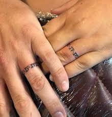 53 Best Ideas For Tattoo Ideas For Couples Husband Wife Ring Finger Roman Numerals Ring Finger Tattoos Wedding Tattoos Couple Tattoos Unique