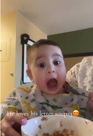 Kid Eating Meat Ball Soup