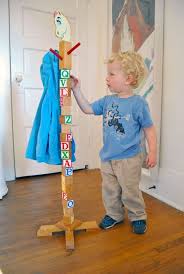 The coat tree is attractive, elegant, and functional with 3 large double hooks for long coats and 3 small double hooks near the top for more coats or hats. 21 Kids Coat Rack Ideas