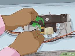 Your fridge's evaporator fan motor sits on grommets to keep it from rattling on the mounting bracket. How To Test An Evaporator Fan Motor 15 Steps With Pictures