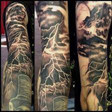 Lightning tattoo with dark clouds: Pin On Nature Tattoos