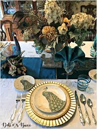 Have you ever fallen in love with a beautiful china or dishware pattern, but then had a difficult time using it in a table setting? Exotic Peacock Tablescape Graces Formal Dining Room Debbee S Buzz