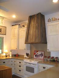 Salvaged Barn Wood Vent Hood Http Www Whisperwoodcottage Com 2012 04 10 Salvaged Pallet Diy Wood Peninsula Kitchen Design Wood Kitchen Cabinets Wood Kitchen