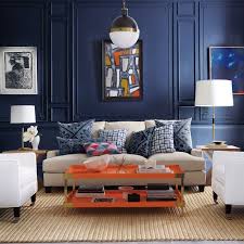 How To Decorate With Orange Without Gagging Blue Living Room Color Blue Living Room Color Scheme Blue And Orange Living Room