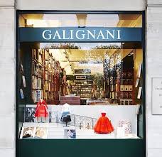 Dior S Book Collection On Display In The Window Of A Parisian Bookshop Lovely Visual Display Visual Merchandising Visual