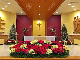 Religious rite celebration in the cathedral with decorations and candles. A Church Altar Decorated With Flowers On Christmas Day Stock Photo Picture And Royalty Free Image Image 35058927