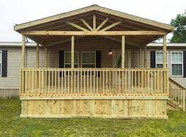 Gable roof porch with timbertech legacy decking in tigerwood and mocha picture frame. Gable Porches Affordable Front Porch Additions Ready Decks