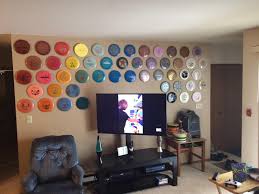 How to display pictures on a wall. Finally Made My Disc Display Wall Look Organized And Not A Jumbled Mess Discgolf
