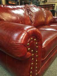 Red Leather Sofa With A Brass Nailhead Trim Perfect To Add A Little Hill Country Style To Any Home Red Leather Sofa Leather Sofa Sofa