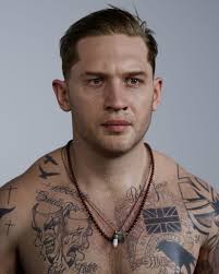 This portrait of Tom Hardy is not a photo but an amazing WIP render created  by Hadi Karimi. The artist accurately replicated the actor's appearance and  tattoos:  https://80.lv/articles/this-portrait-of-tom-hardy-is-not-a-photo-but-an-amazing-artwork/