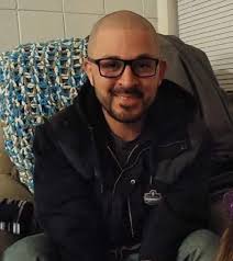 Can someone add my deceased brother to a family photo?