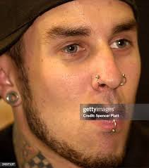 184 Male Ear Piercing Stock Photos, High-Res Pictures, and Images